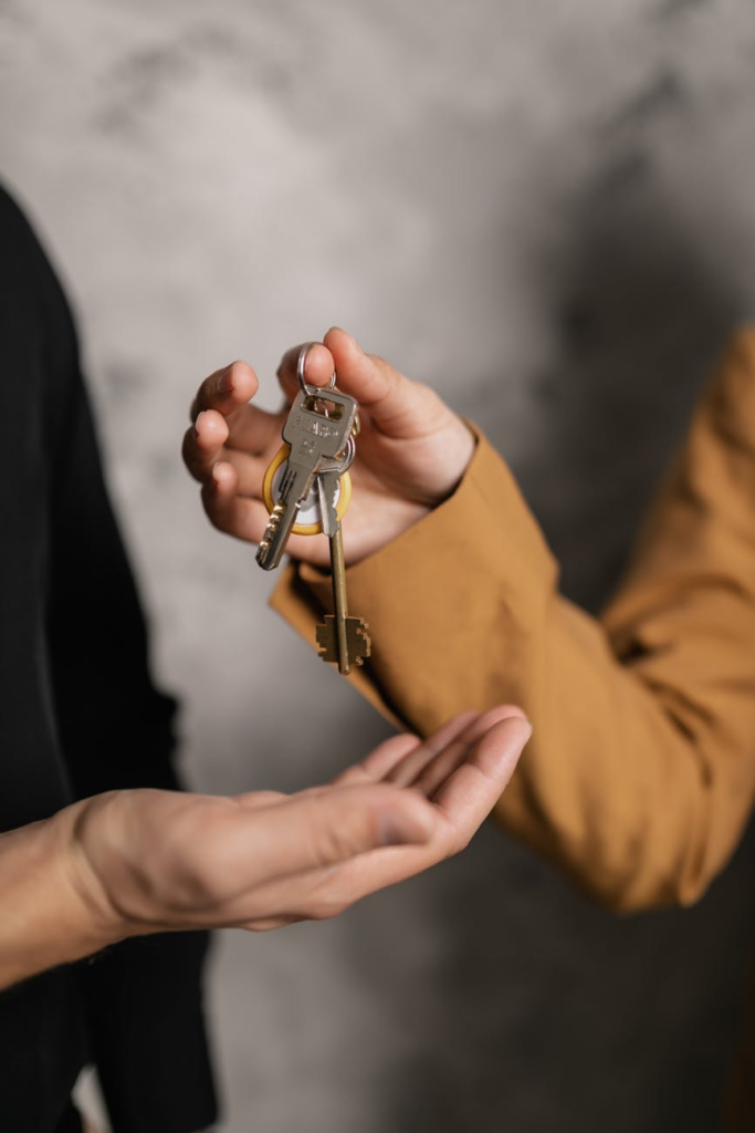 Tenant handing over keys to the landlord