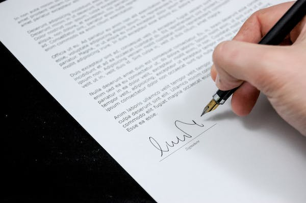 signing a letter